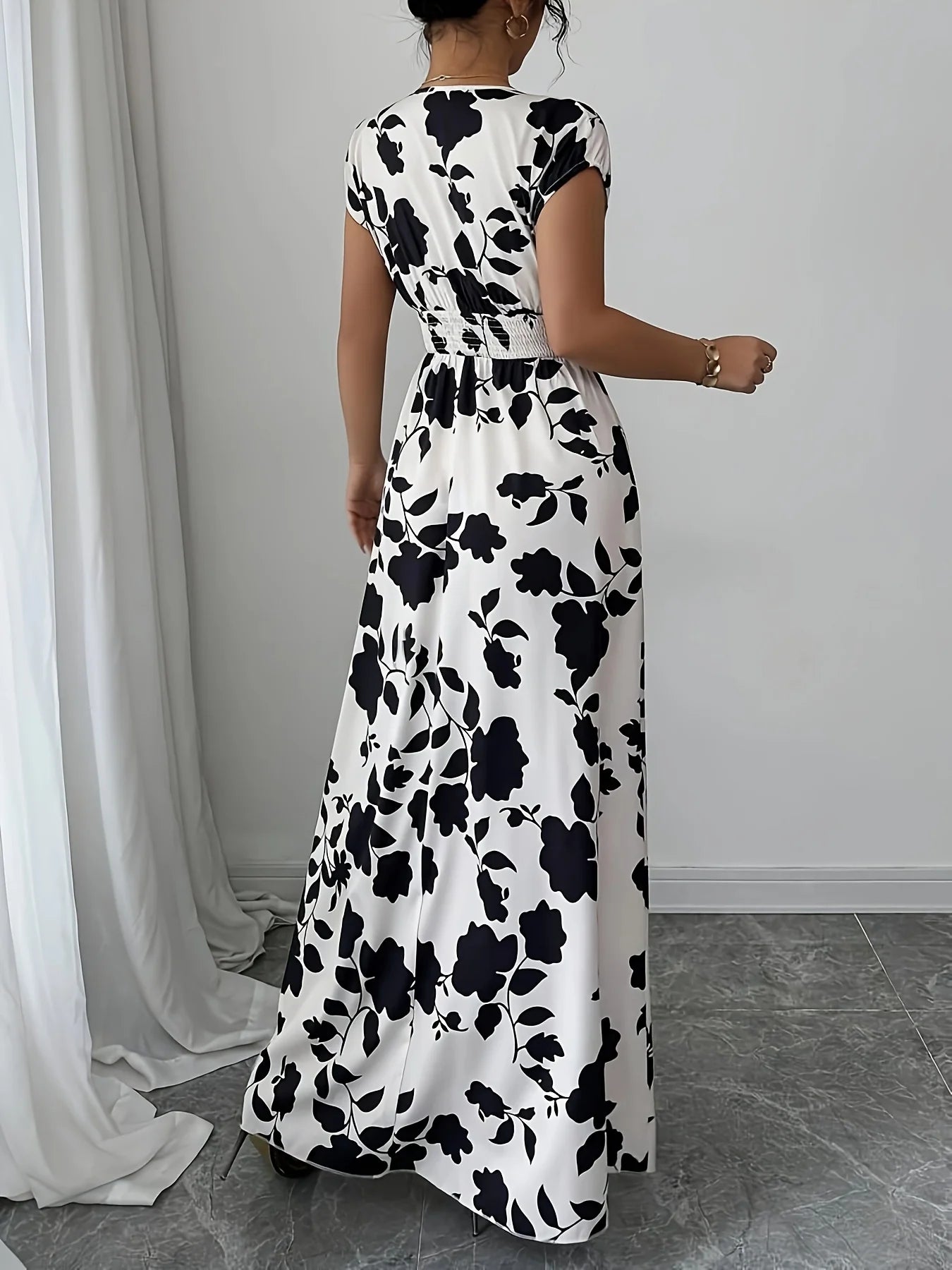 Elegant Black & White Floral V-Neck Maxi Dress