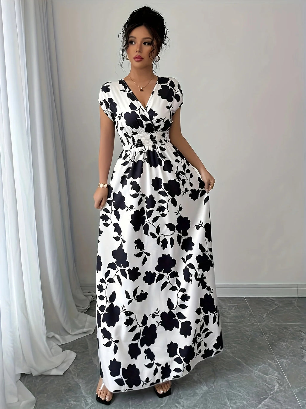 Elegant Black & White Floral V-Neck Maxi Dress